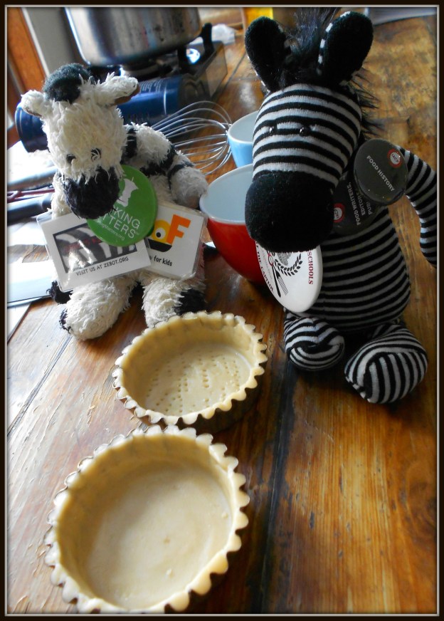 See the little holes in one  tart crust? That's called "docking" and it's the same for cookies.